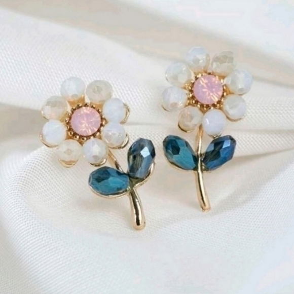 Anthropologie Jewelry - ANTHROPOLOGIE FLORAL STUD EARRINGS
